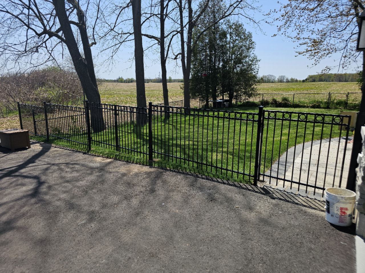 Black aluminum fence with ring detail