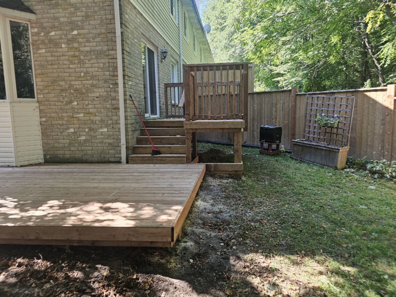 Pressure-treated deck with steps & railing