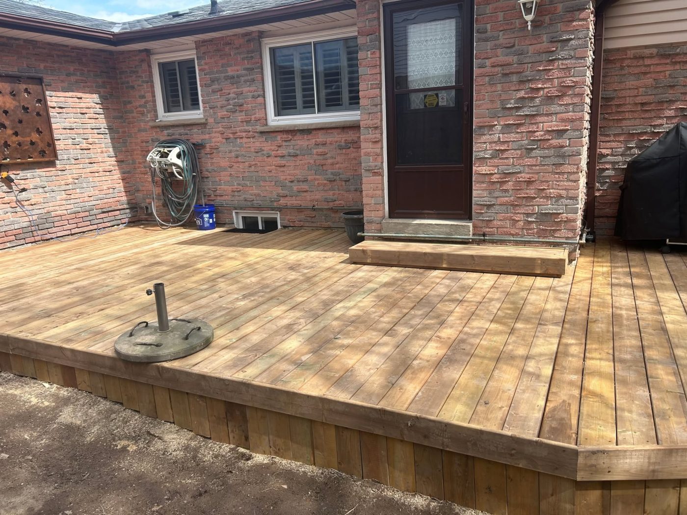 Ground-level cedar patio deck