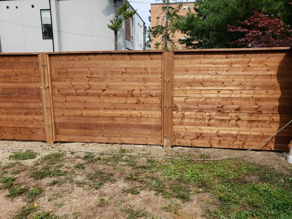 Privacy fence with framed top