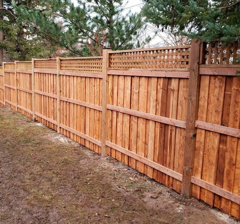 Long cedar privacy fence run