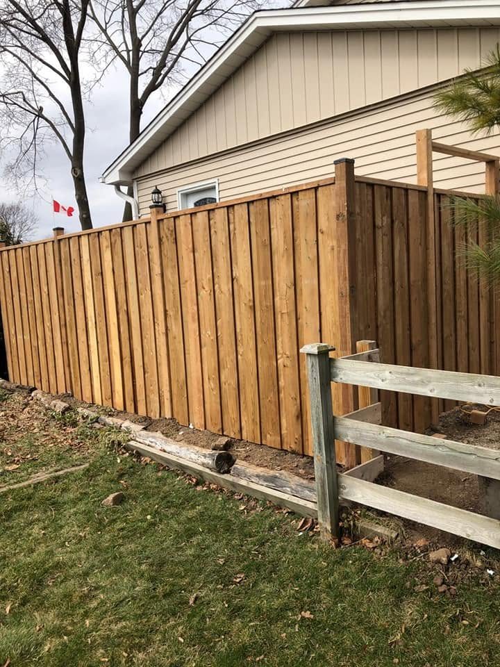 New cedar fence beside the old rail line